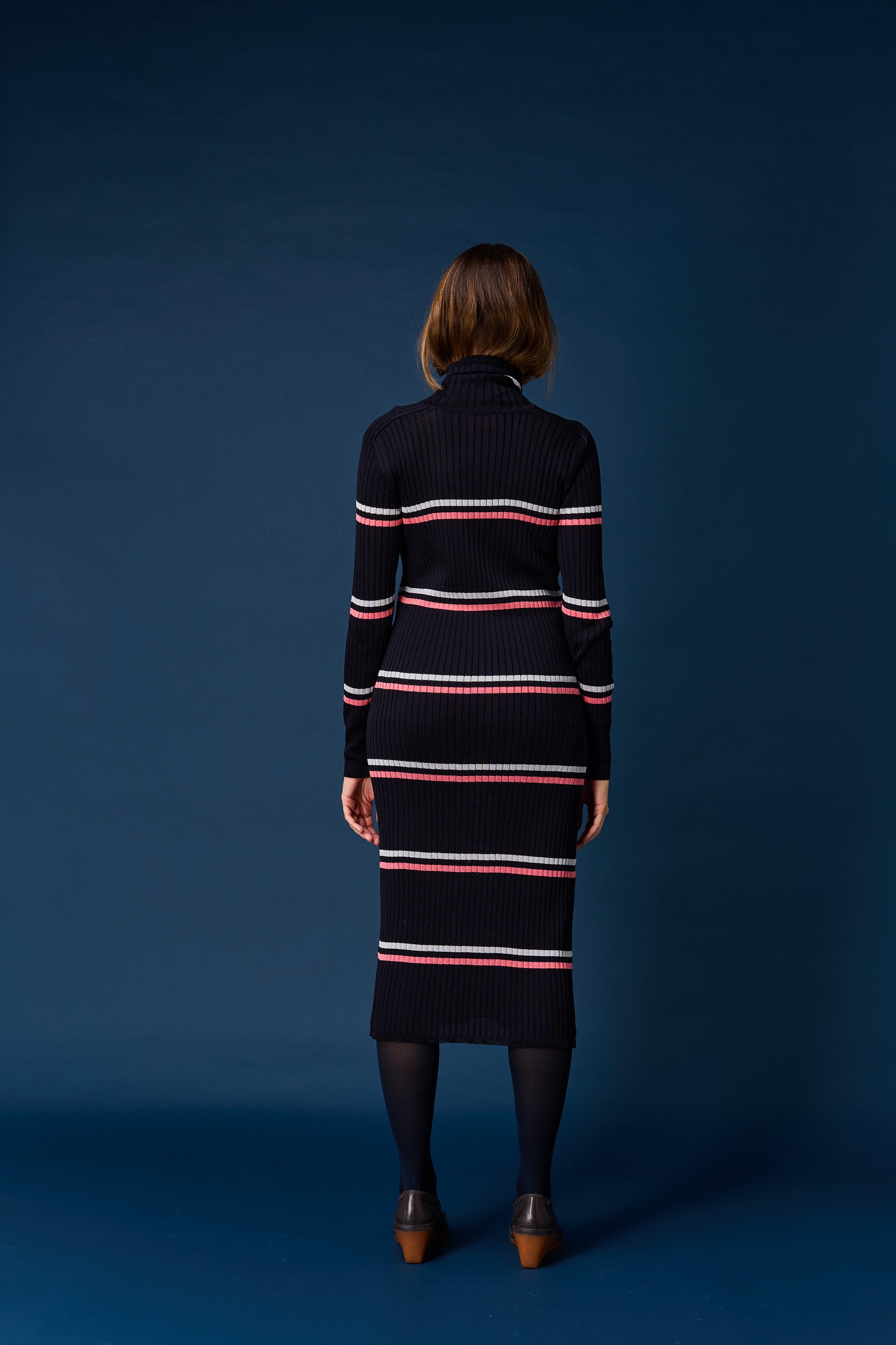 Skin turtleneck dress
